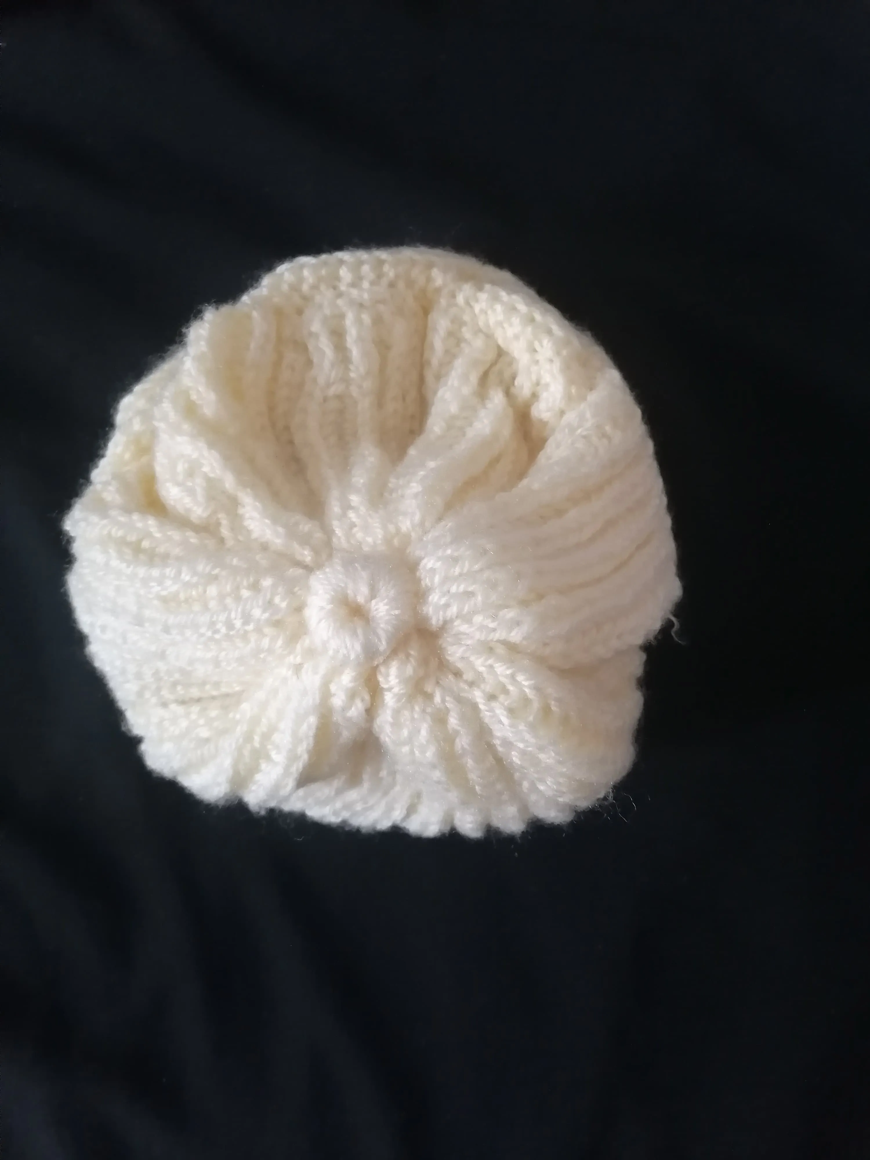 Cream Colored Hand Knitted Twisted Hat