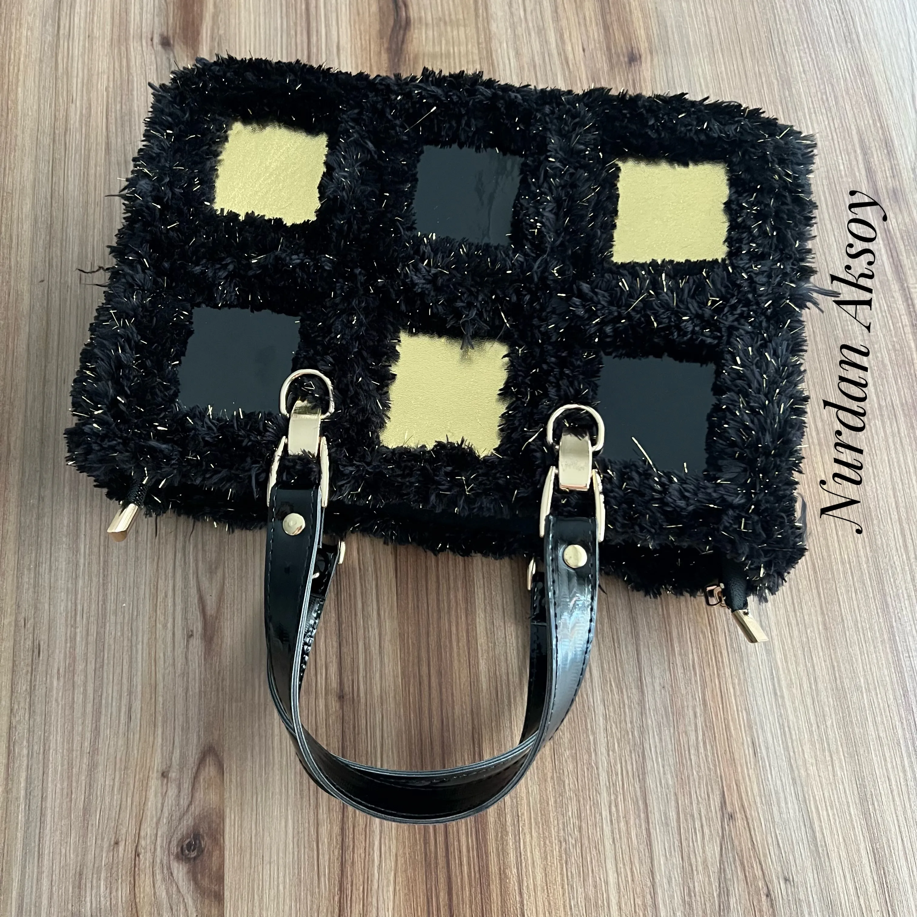 Stylish bag with handmade square leather motifs