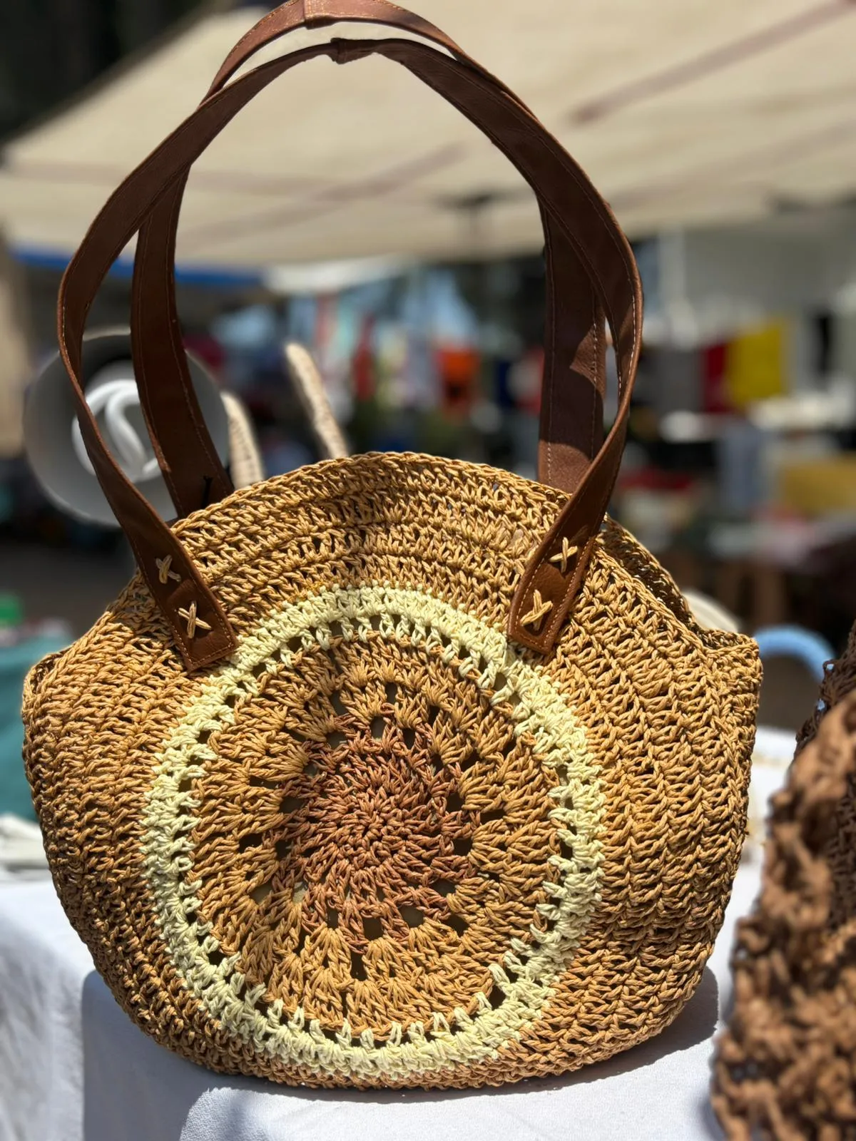 Straw bag with leather handles