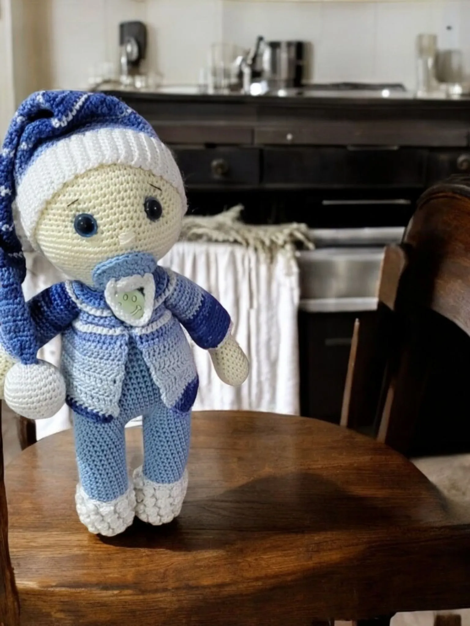 Amigurumi baby with pacifier