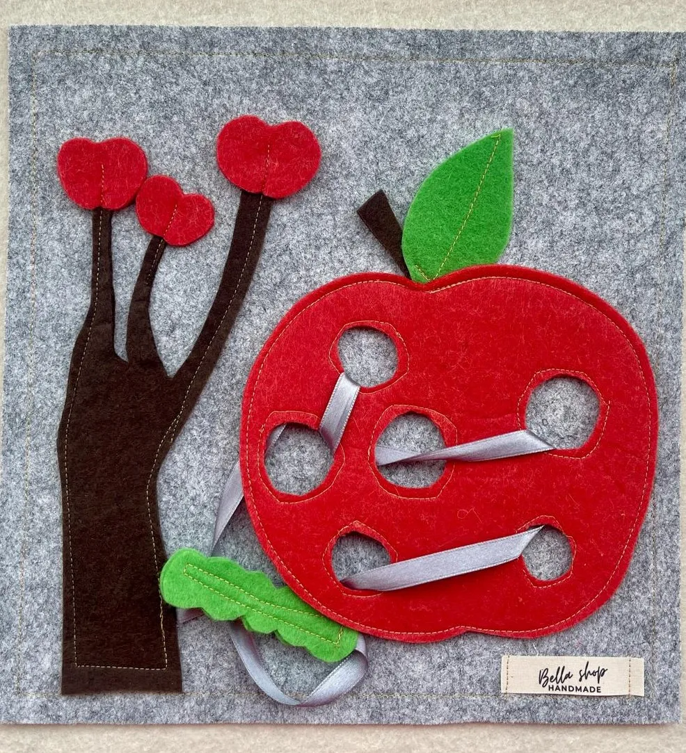 Apple Designed Rope-Track Felt Story Toy