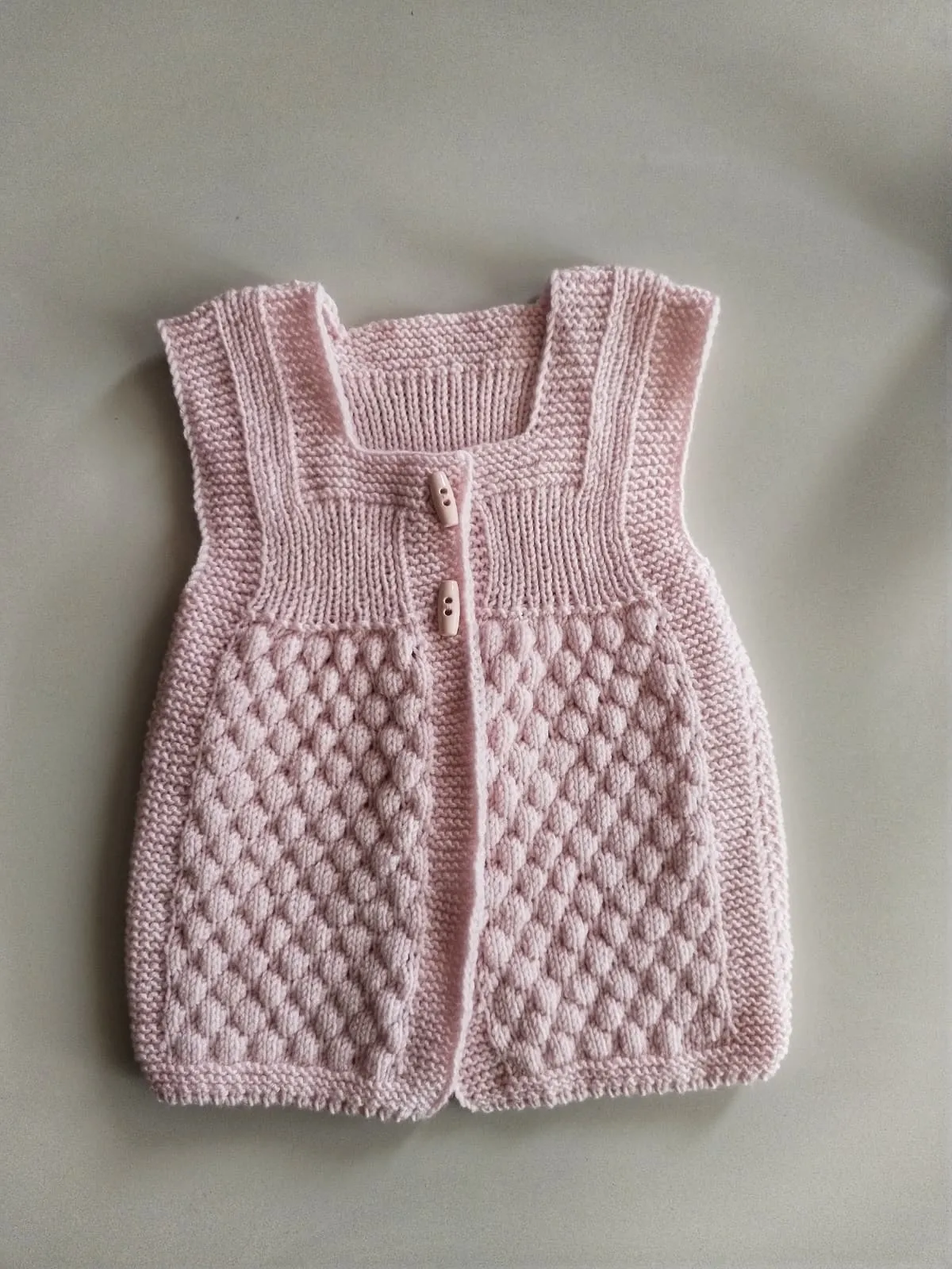 El Örgüsü Pembe Bebek Yeleği