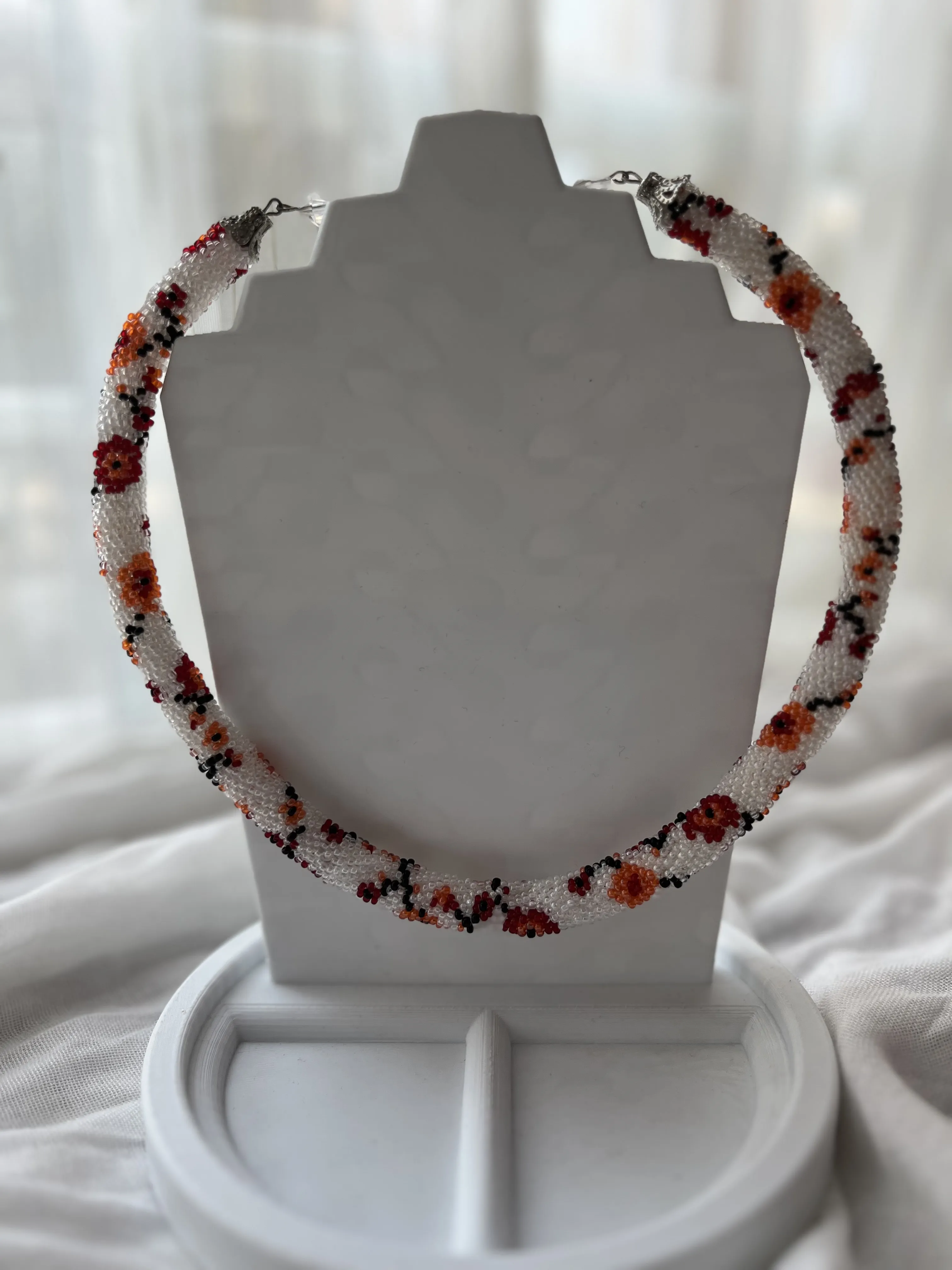 White Background with Flower Patterned Beaded Necklace - Prison Work
