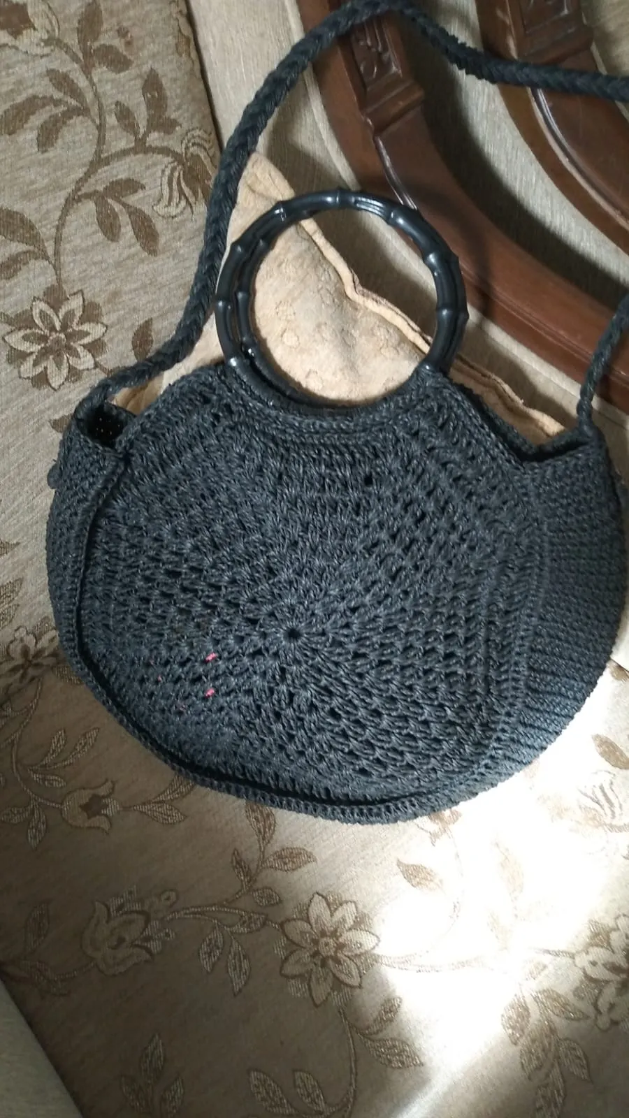 Handmade black bag knitted with custom designed paper yarn