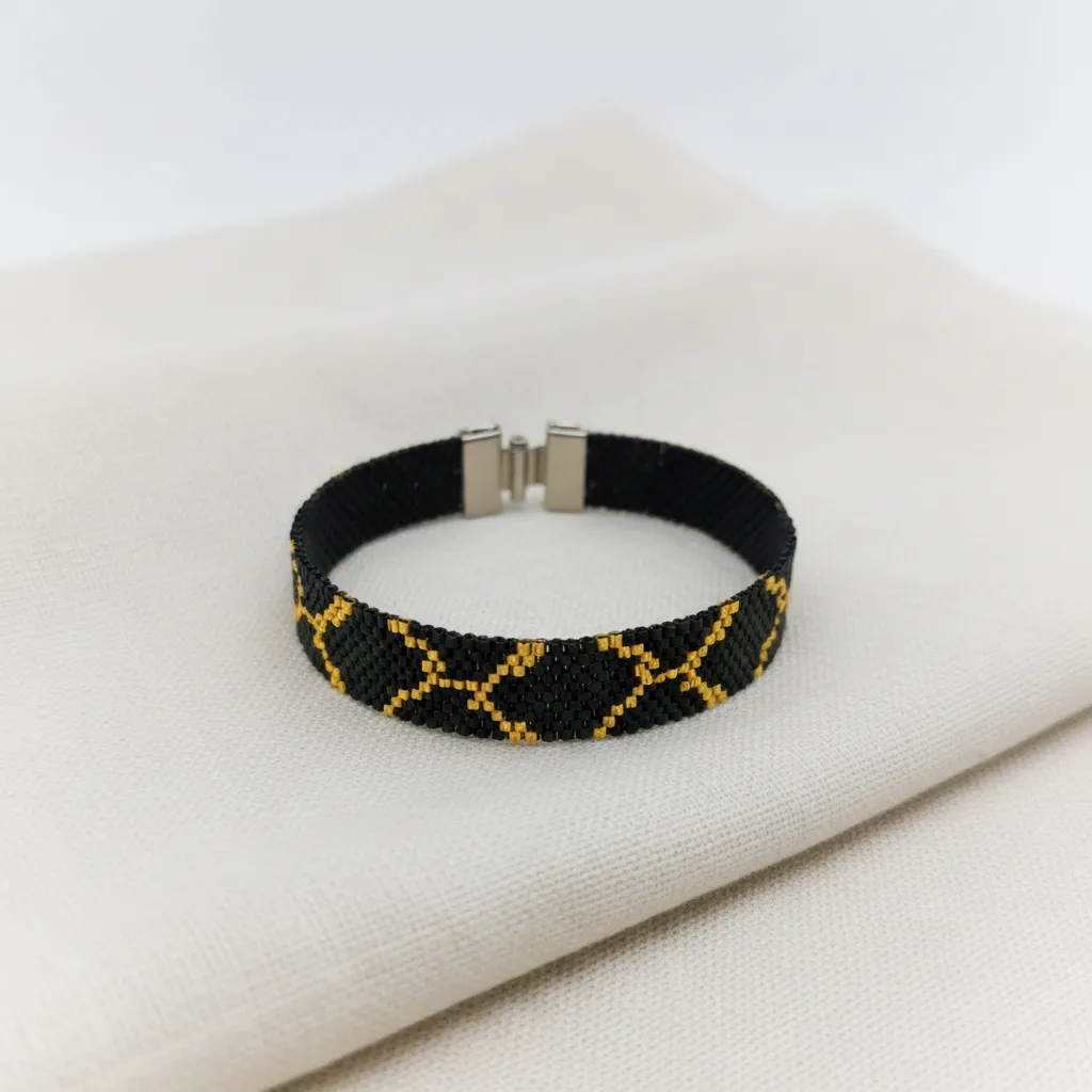 Siyah ve Altın Rengi Yılan Desenli Miyuki Boncuk Bileklik