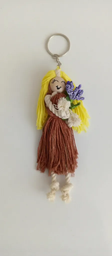 Blonde macrame baby figure keychain