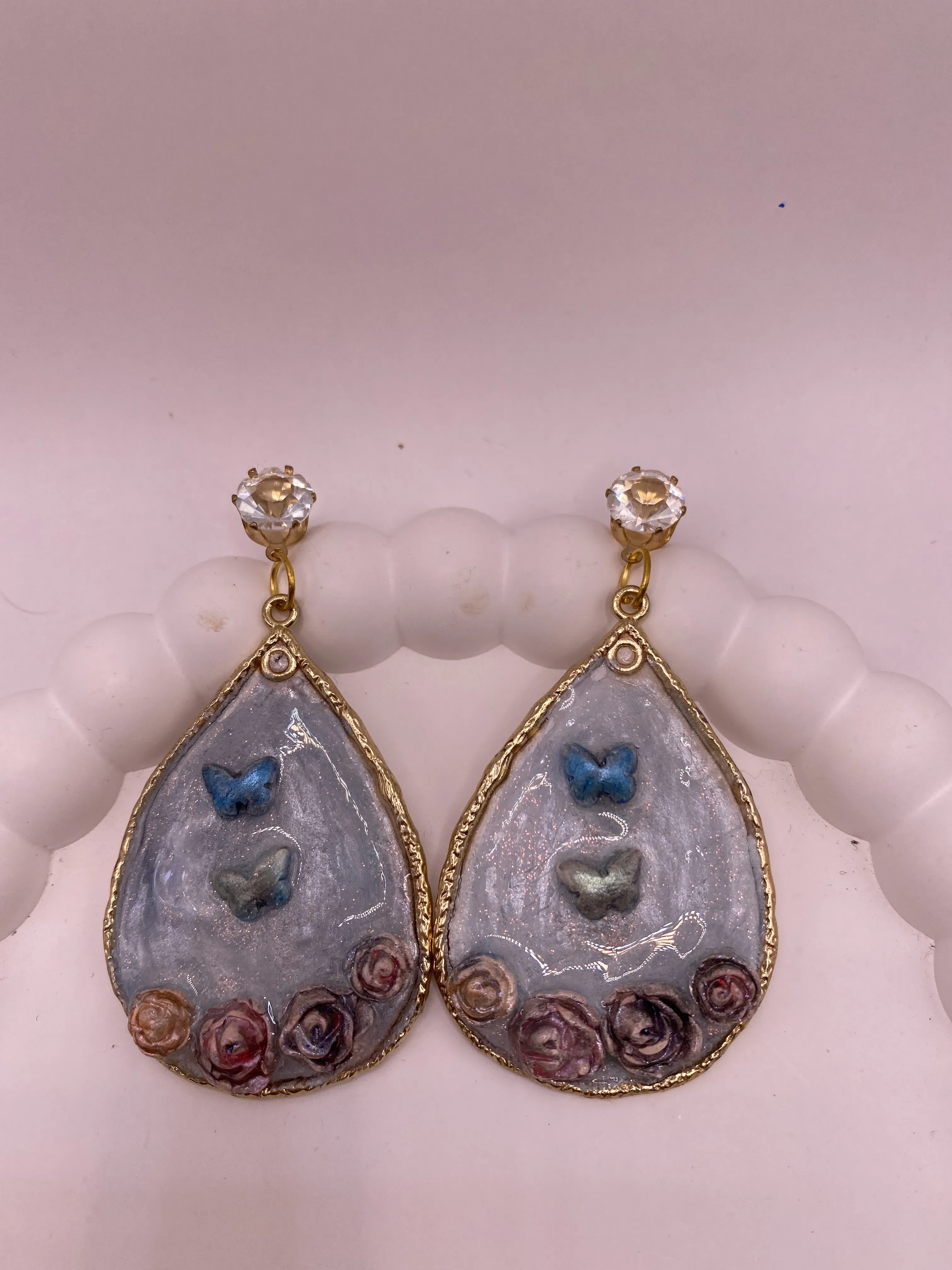 Handmade Pastel Blue Resin Butterfly and Rose Detailed Drop Earrings