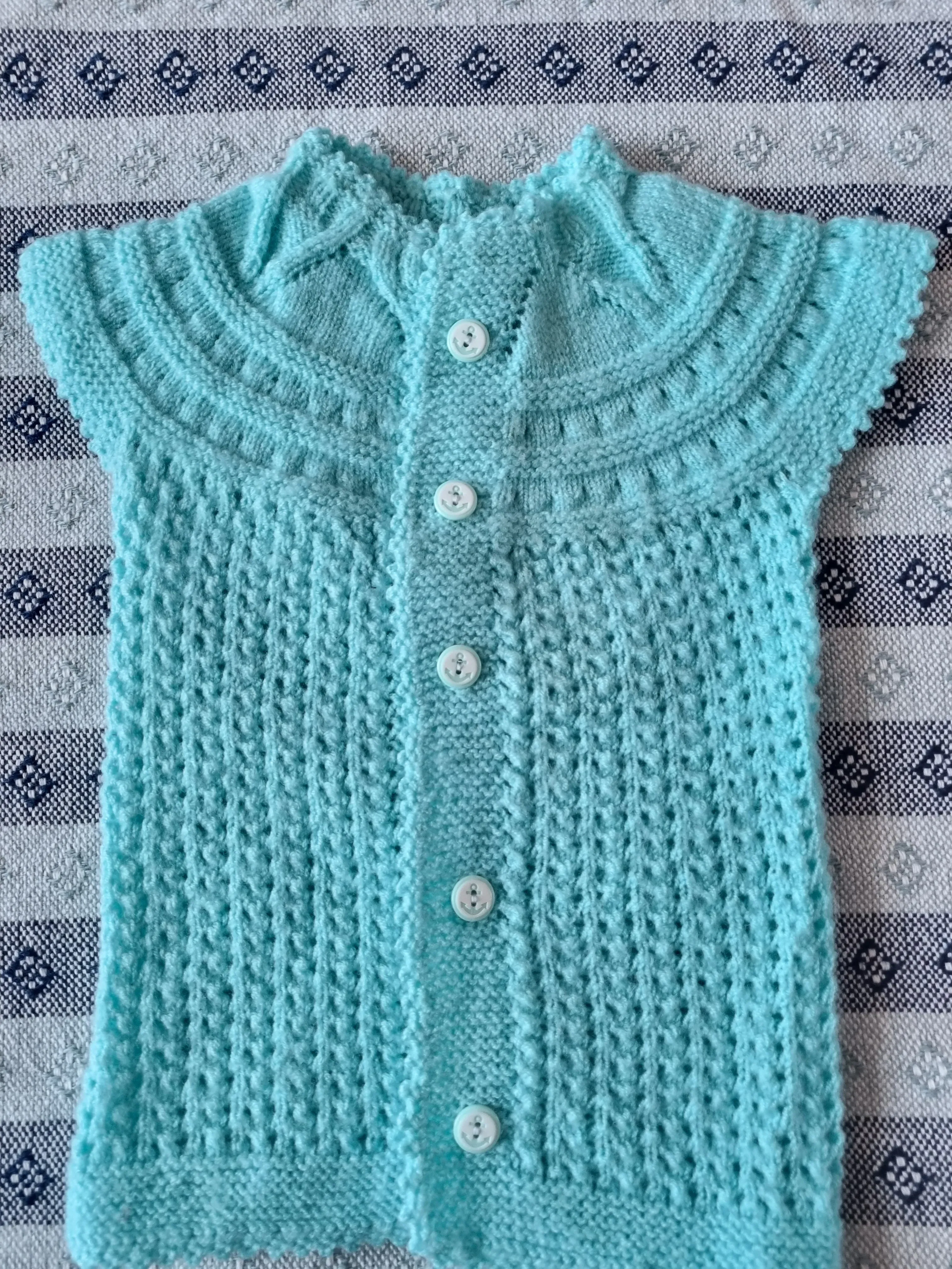 Turkuaz Renkli Örgü Bebek Yeleği - Düğmeli, El Emeği