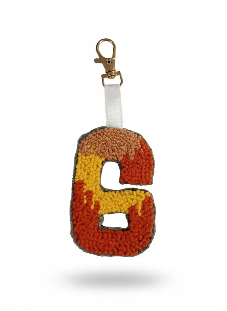 Turuncu, Sarı ve Kahverengi Tonlarında 6 Rakamı Şeklinde Anahtarlık