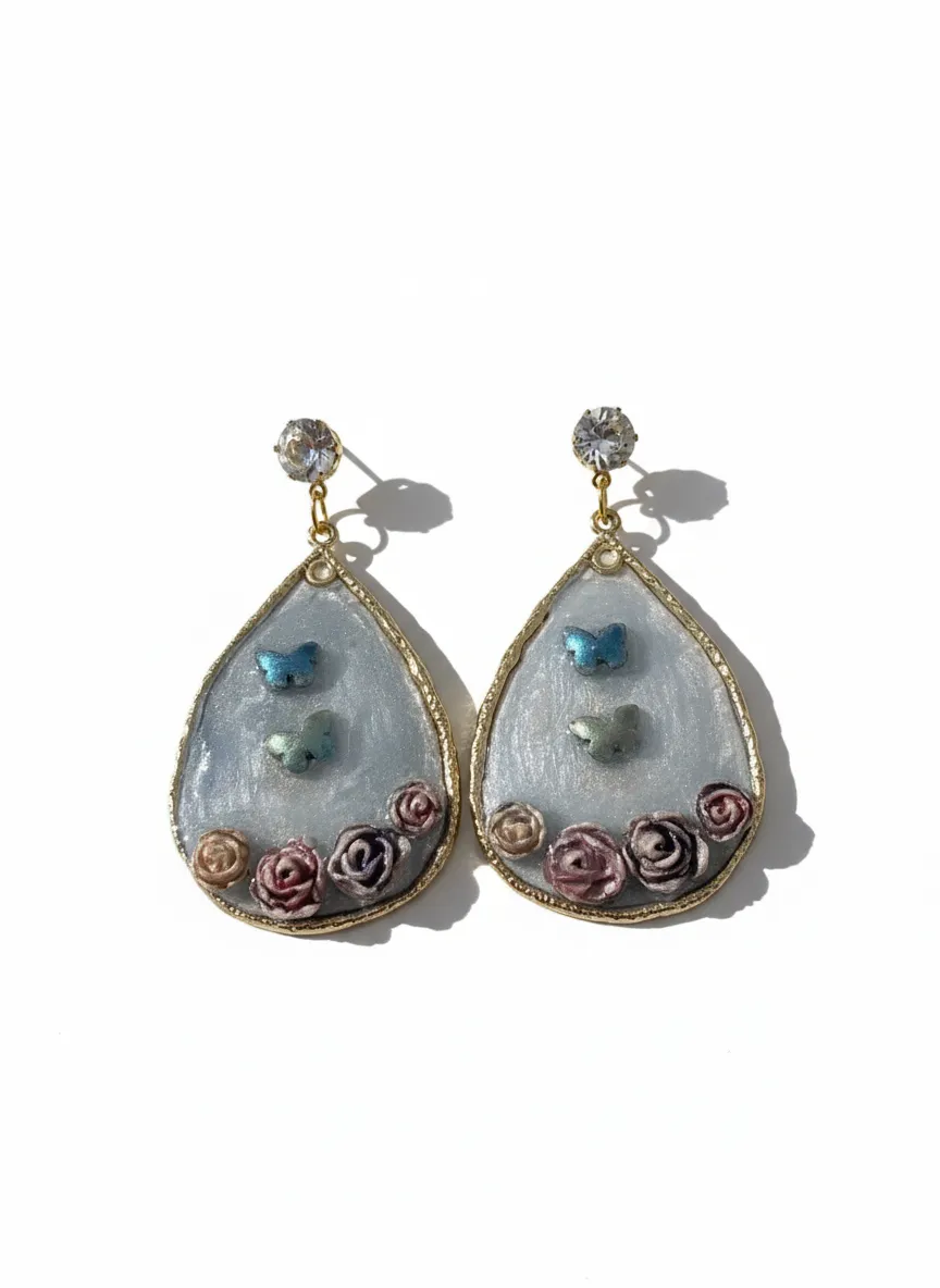 Handmade Pastel Blue Resin Butterfly and Rose Detailed Drop Earrings